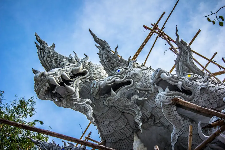 A Detailed Dragon Sculpture With Scaffolding In Amphoe Mueang Ubon Rat