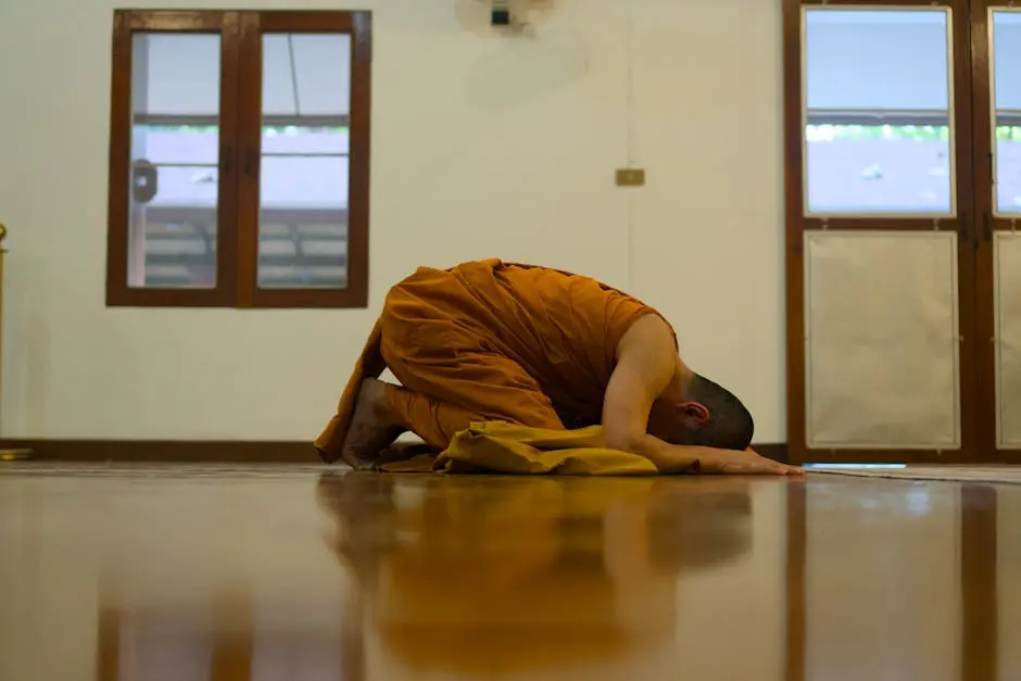 A Serene Scene Of A Monk Practicing Meditation Inside A Chiang Mai Tem