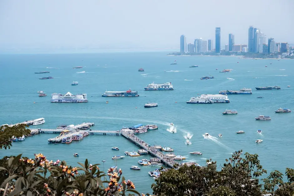 A Vibrant Harbor Scene With Boats In Pattaya City Thailand