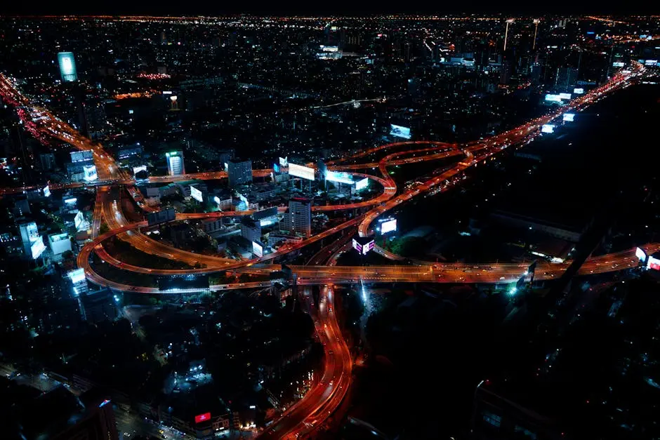 Aerial View Of Bangkok S Vibrant City Lights And Roads At Night