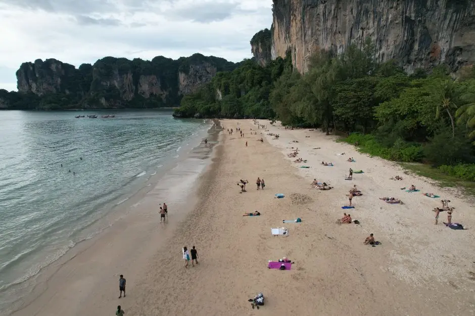 Aerial View Of Railay Beach S Sandy Shores And Lush Cliffs In Thailand