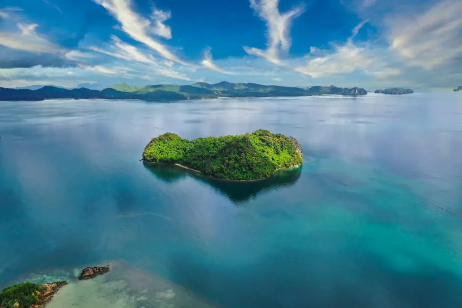 Amazing Landscape Of Island Covered With Green Trees Located In Turquo