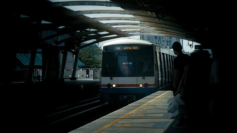 Bts Train Arriving At A Busy Bangkok Station Platform Capturing Urban