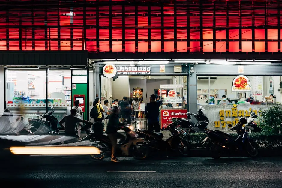 Bustling Night Market Scene With People And Street Food In Thailand Fe