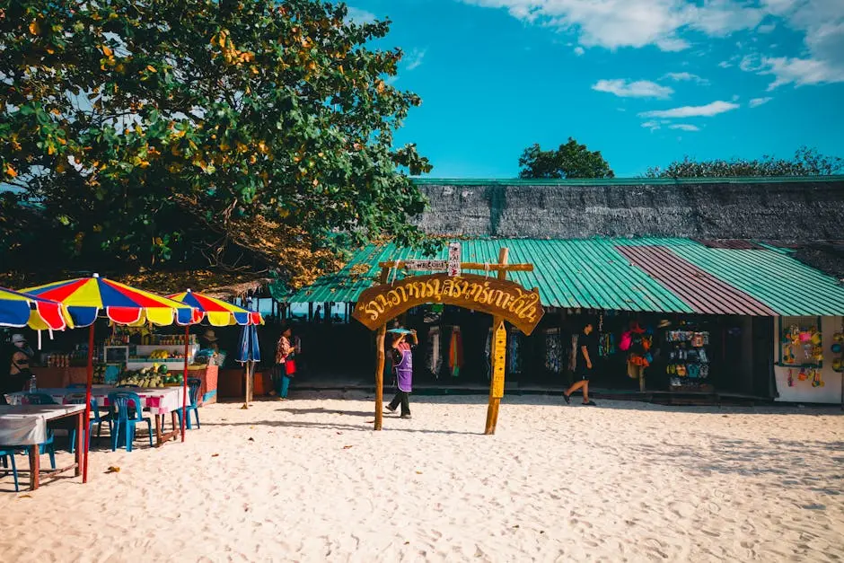 Colorful Umbrellas And Market On A Sunny Beach In Phuket Thailand
