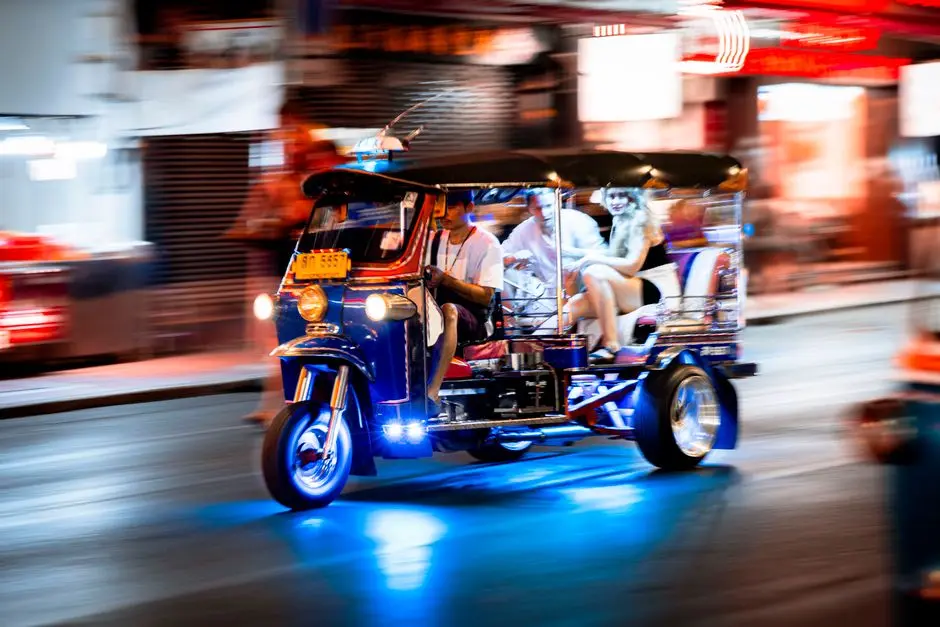 Experience The Vibrant Nightlife Of Bangkok With A Tuk Tuk Ride Throug