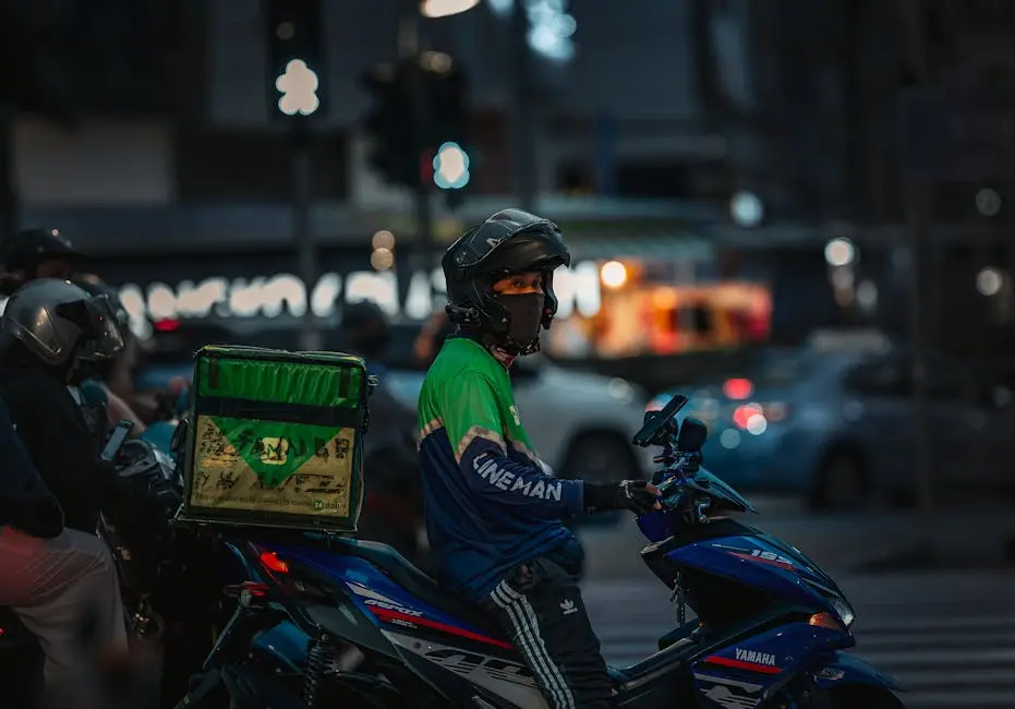 Food Delivery Rider On Motorbike At Night In Bangkok Thailand