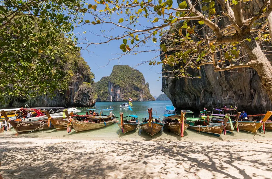 Idyllic Beach Scene With Boats Docked At Krabi Thailand And Beautiful