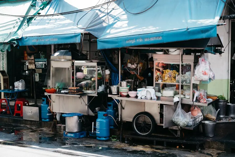 Local Street Food Cart In Bangkok Showcasing Vibrant Market Culture An