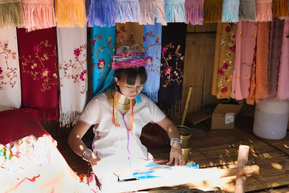 Long Neck Karen Woman Weaving Traditional Textiles In Chiang Mai Thail