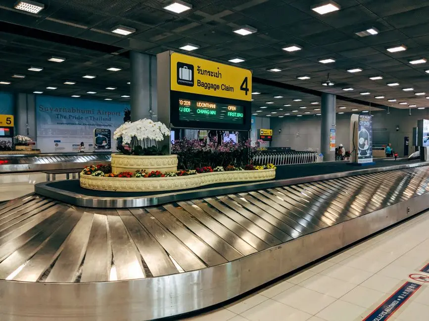 Modern Baggage Claim Area At Suvarnabhumi Airport In Bangkok With Lugg