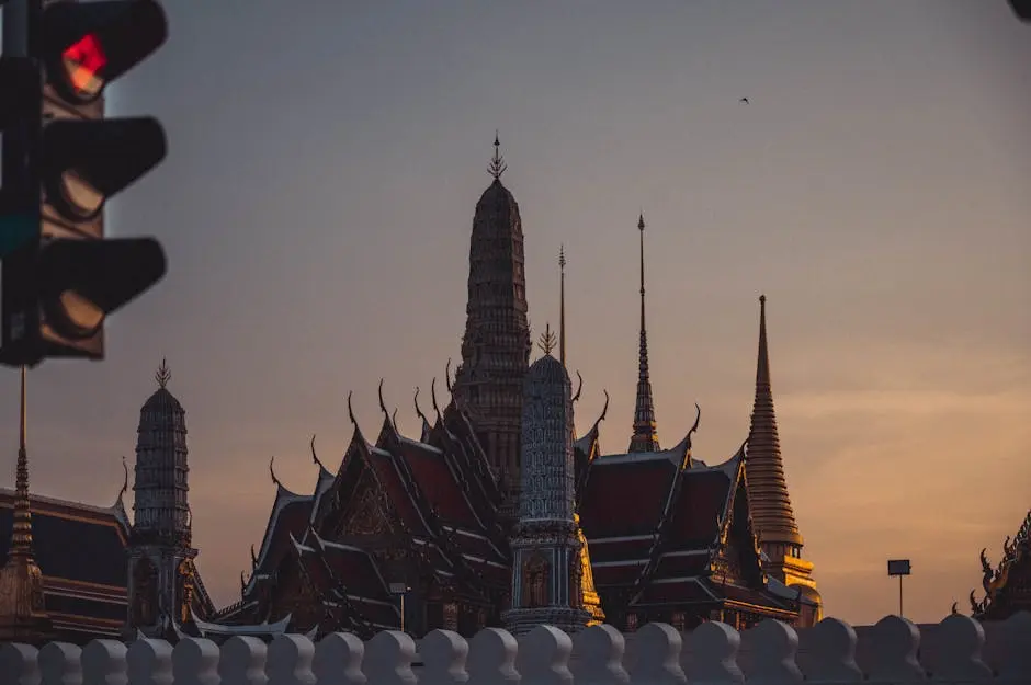 Silhouette Of Wat Phra Kaew Temple At Sunset Showcasing Bangkok S Arch