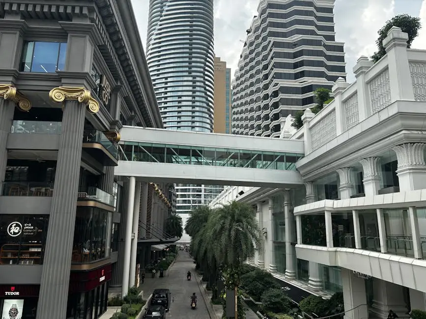 Skywalk Connecting Modern Buildings In A Busy Bangkok Street