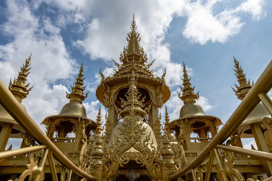 Stunning Golden Temple Architecture In Chiang Rai Thailand Under A Bri