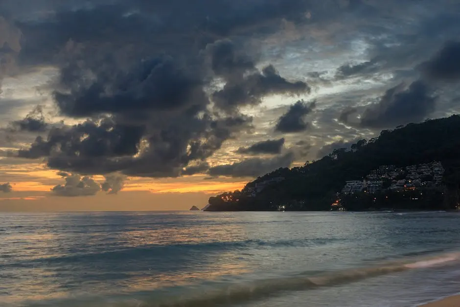 Stunning Sunset Over Patong Beach Phuket With Dramatic Clouds And Calm