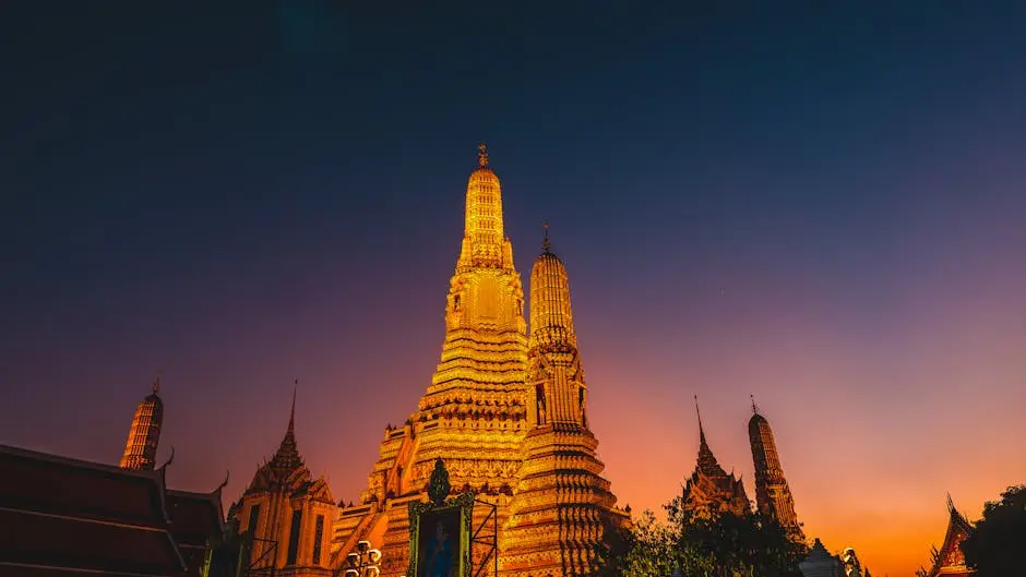 Stunning View Of Wat Arun Temple In Bangkok At Sunset Capturing Its Go