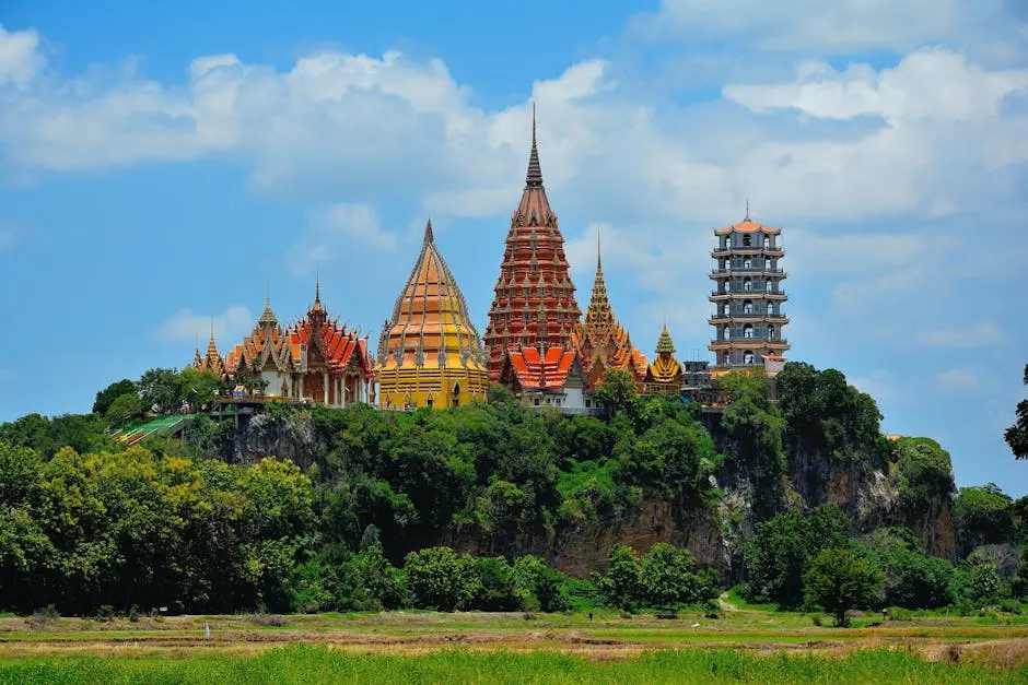 Stunning View Of Wat Tham Suea Temple In Thailand Surrounded By Lush G