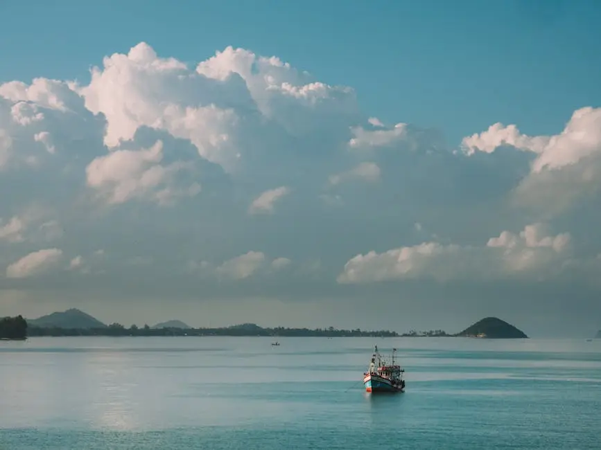 Tranquil Seascape With Fishing Boat In Surat Thani Thailand Under Brig