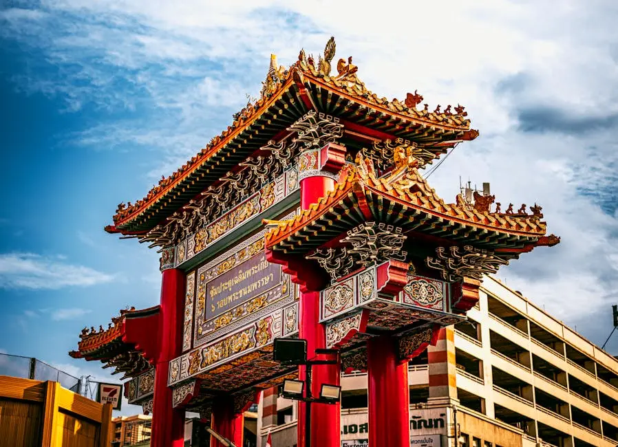 Vibrant Chinatown Gate Under Clear Sky In Bangkok Showcasing Tradition