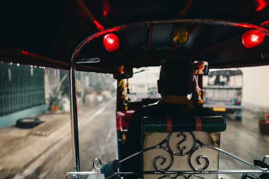 View From A Tuk Tuk In Rainy Bangkok Capturing The Vibrant City Life A